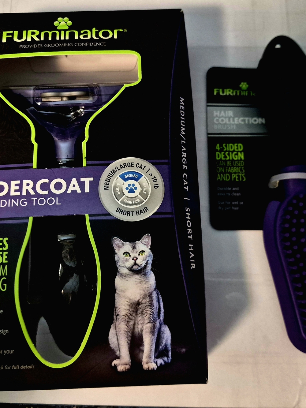 FURminator Purple and Green Short Hair Cat Undercoat Grooming Tool